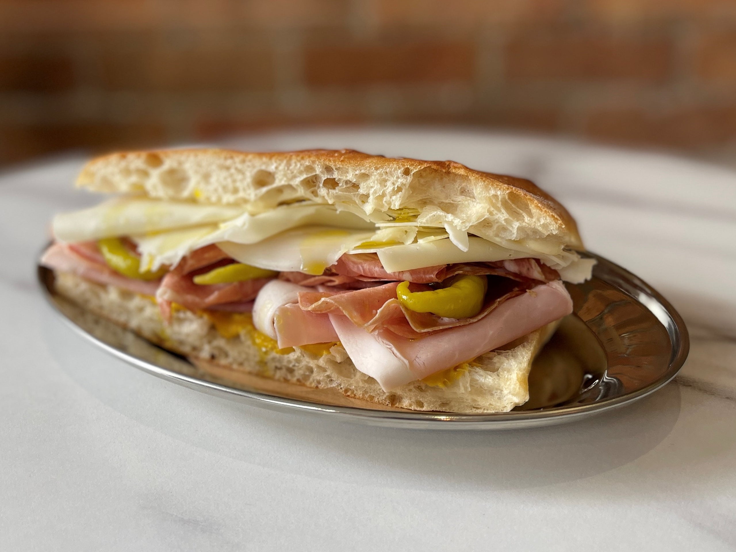 Prosciutto Cotto, Mortadella, Finocchiona & Provolone Panini Arno Deli